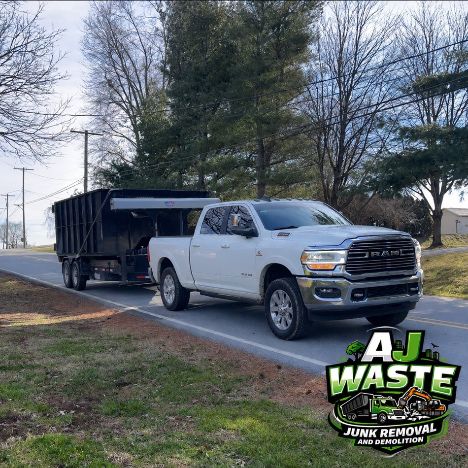 AJ Waste crew loading a truck on a junk removal job